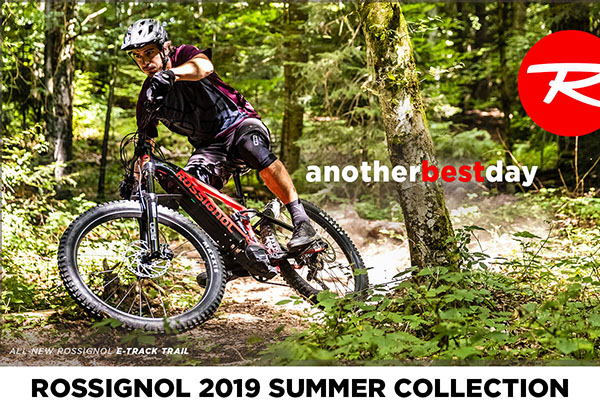 A mountain bikers rides a Rossignol e-bike