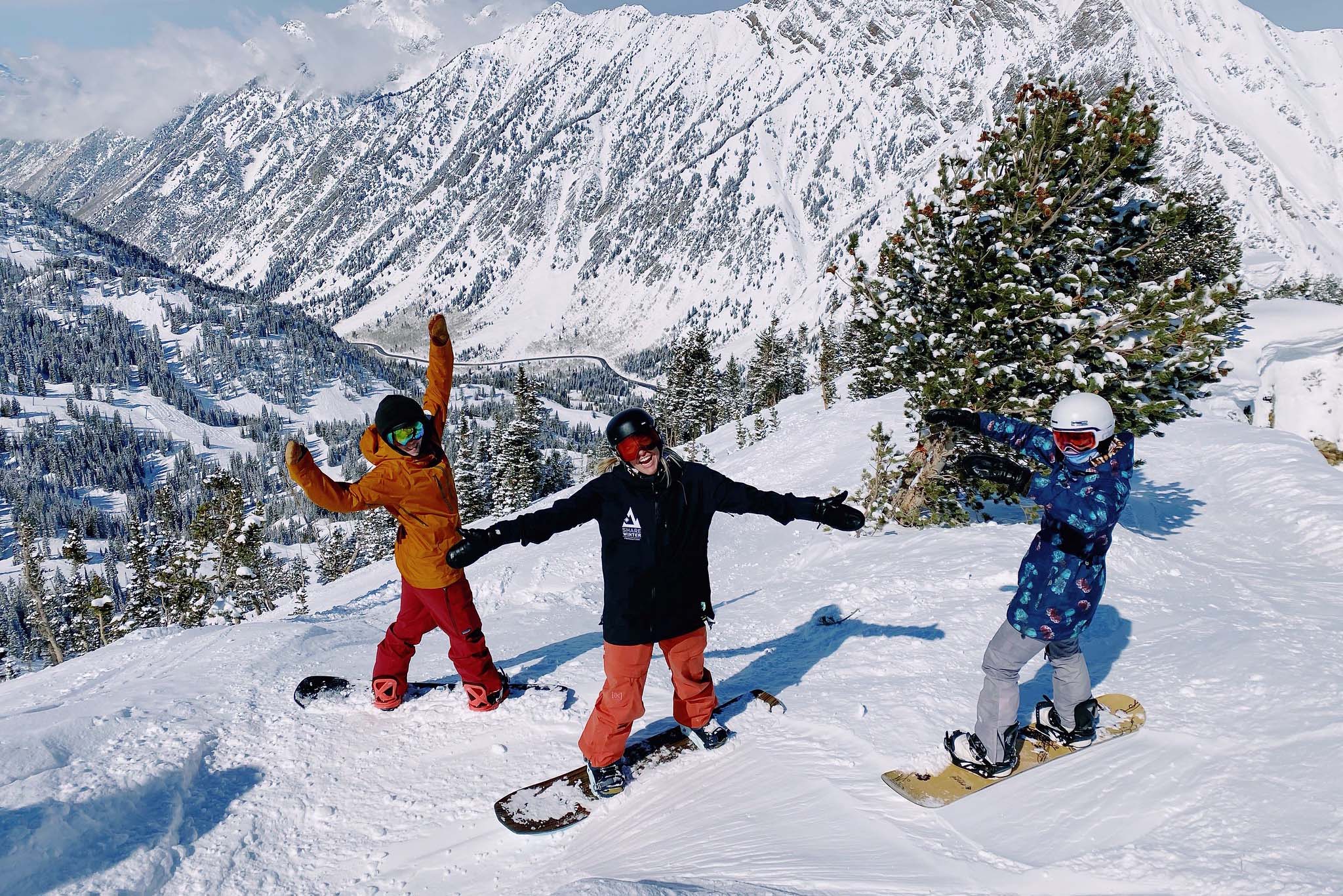 Snowboarders at the 2020 Women's Summit ride Snowbird