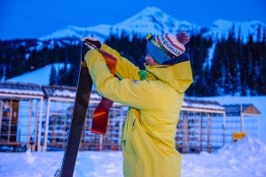 A skier put skins on his touring skis